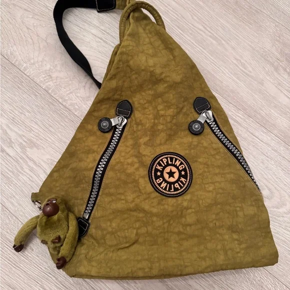 Kipling Khaki Sling Backpack with Monkey Charm Amazon.com | Kipling Women main image 3